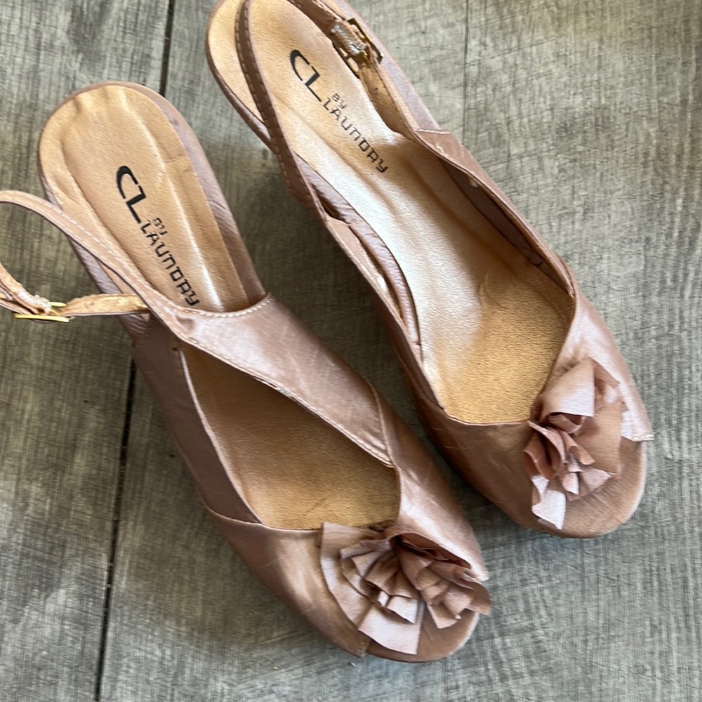 Women’s gold silk like wedges approximately 4” high good condition